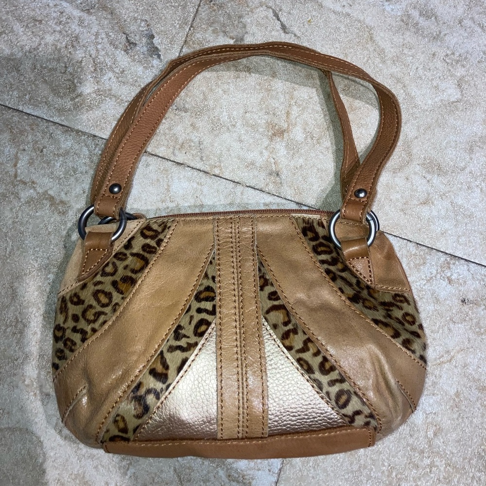 Fossil cheetah handbag.